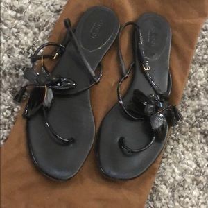 Gucci black orchid flip flops